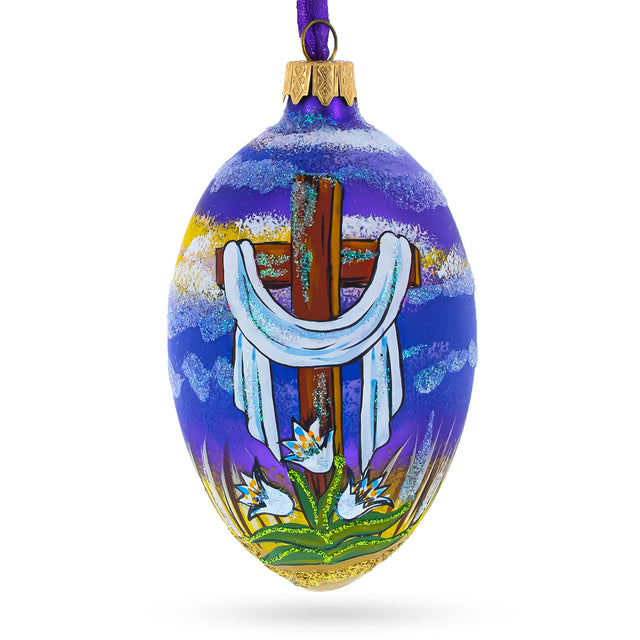 The Rising Cross Egg Glass Ornament 4 Inches in Blue color, Oval shape