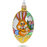 Bunny With Flowers Egg Glass Ornament 4 Inches in Yellow color, Oval shape