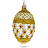 Gold Stars On Trellis Egg Glass Ornament 4 Inches in Gold color Oval