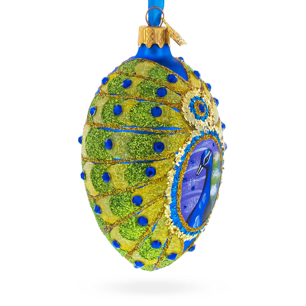 Peacock Glass Egg Ornament 4 InchesUkraine , dimensions in inches: 4 x 2.4 x 2.77