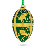 Golden Leaves On Green Glass Egg Ornament 4 Inches in Green color, Oval shape