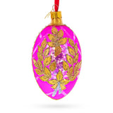 Golden Branches On Pink Glass Egg Ornament 4 Inches in Pink color Oval