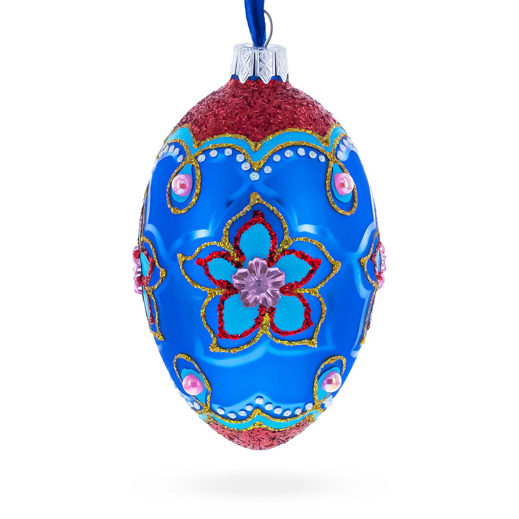 Blue Petals Flower Glass Egg Ornament 4 Inches in Blue color Oval