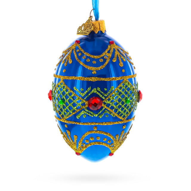 Jeweled Red on Blue Glass Egg Ornament 4 Inches in Blue color Oval