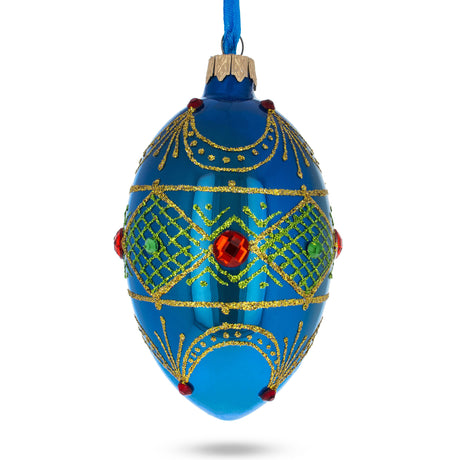 Glass Jeweled Red Ruby on Blue Glass Egg Ornament 4 Inches in Blue color Oval