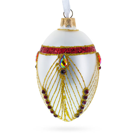 Red Jewels Eccentrics on White Glass Egg Ornament 4 Inches in White color Oval