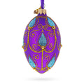Blue Leaf on Purple Glass Egg Ornament 4 Inches in Purple color Oval