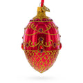 Red Jewels on Glossy Red Glass Egg Ornament 4 Inches in Red color Oval