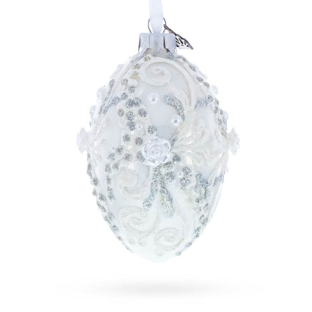 Silver Glitter Scrolls, Pearls & Rose Accents Winter Elegance Glass Egg Ornament 4 Inches in White color Oval