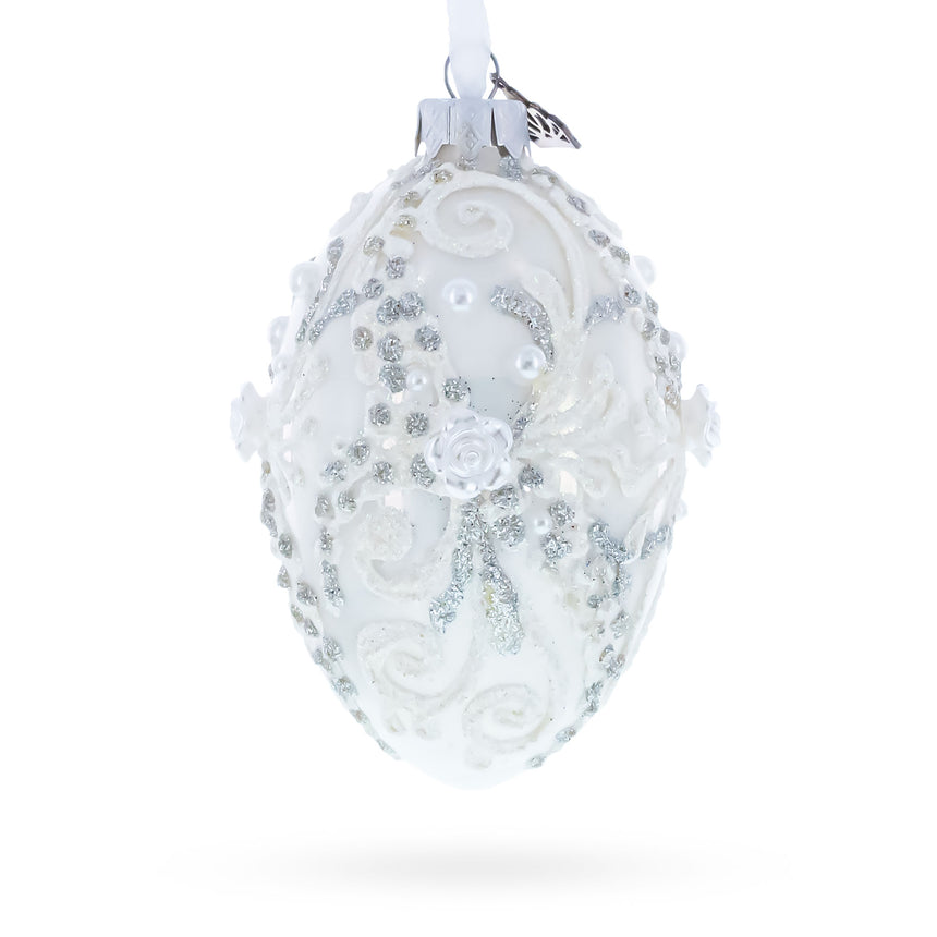 Silver Glitter Scrolls, Pearls & Rose Accents Winter Elegance Glass Egg Ornament 4 Inches in White color Oval