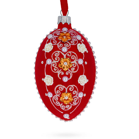 Glass Jeweled Flowers on Red Glass Egg Christmas Ornament 4 Inches in Red color Oval
