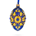 Golden Leaves on Blue Glass Egg Christmas Ornament 4 Inches in Blue color Oval