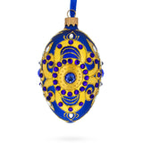 Golden Leaves on Blue Glass Egg Christmas Ornament 4 Inches in Blue color Oval