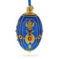 Golden Eagle on Blue Glass Egg Christmas Ornament 4 Inches in Blue color Oval