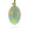 Golden Wheat on Turquoise Glass Egg Christmas Ornament 4 Inches in Blue color, Oval shape