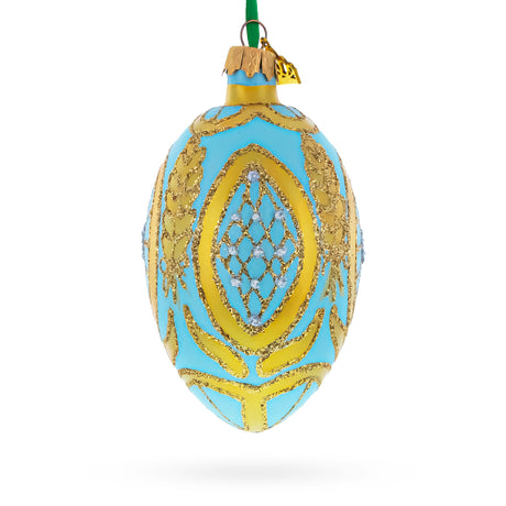 Golden Wheat on Turquoise Glass Egg Christmas Ornament 4 Inches in Blue color Oval
