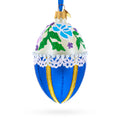 Flowers on Beige and Blue Glass Egg Christmas Ornament 4 Inches in Blue color Oval