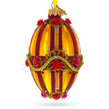 Golden Stripes over Pearls and Roses Glass Egg Christmas Ornament 4 Inches in Orange color, Oval shape