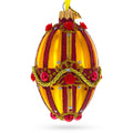 Golden Stripes over Pearls and Roses Glass Egg Christmas Ornament 4 Inches in Orange color Oval