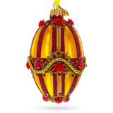 Golden Stripes over Pearls and Roses Glass Egg Christmas Ornament 4 Inches in Orange color Oval