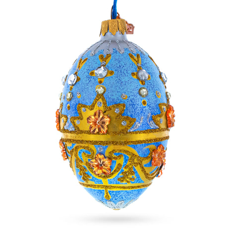 Glass Golden Flowers on Speckled Blue Glass Egg Christmas Ornament 4 Inches in Blue color Oval