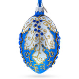 Glass Blue Grapes on White Glass Egg Ornament 4 Inches in Blue color Oval