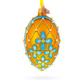 Blue Flowers on Gold Glass Egg Ornament 4 Inches in Yellow color Oval
