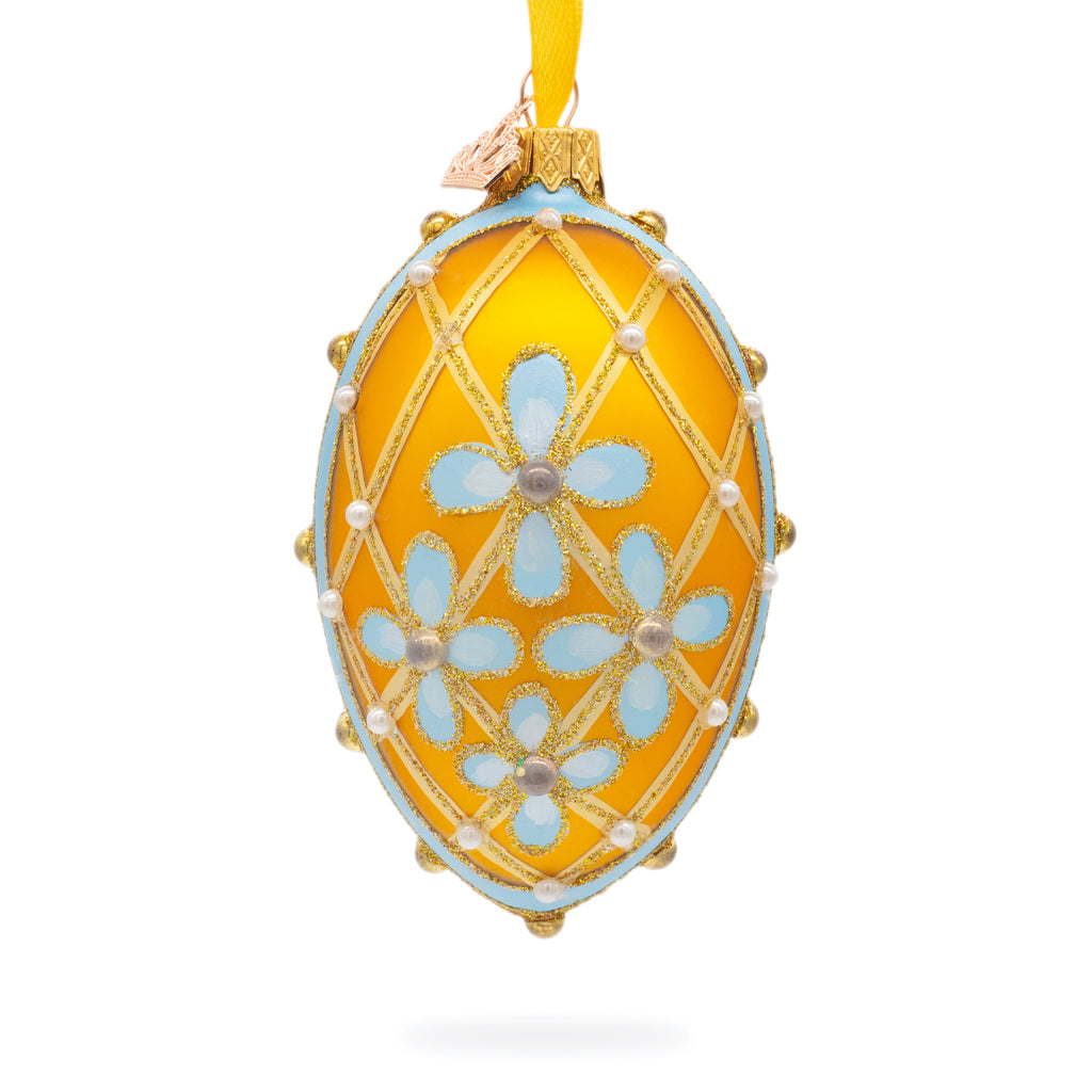 Blue Flowers on Gold Glass Egg Ornament 4 Inches in Yellow color, Oval shape