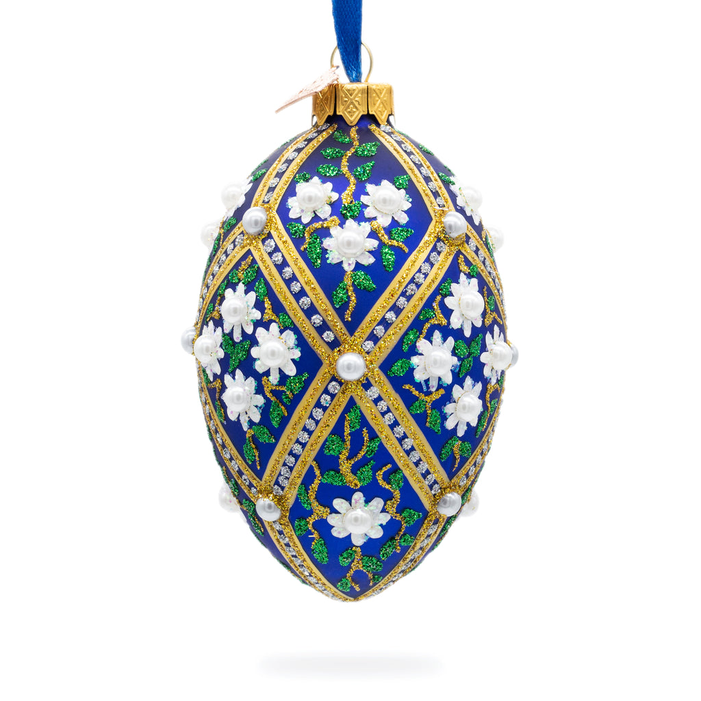 White Pearl Flowers on Blue Glass Egg Ornament 4 Inches in Multi color Oval