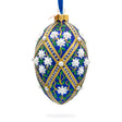 White Pearl Flowers on Blue Glass Egg Ornament 4 Inches in Multi color Oval