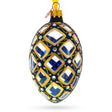 Glass Mosaic Pattern on Blue Glass Egg Ornament 4 Inches in Multi color Oval