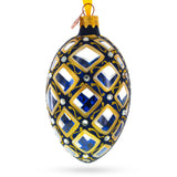 Glass Mosaic Pattern on Blue Glass Egg Ornament 4 Inches in Multi color Oval