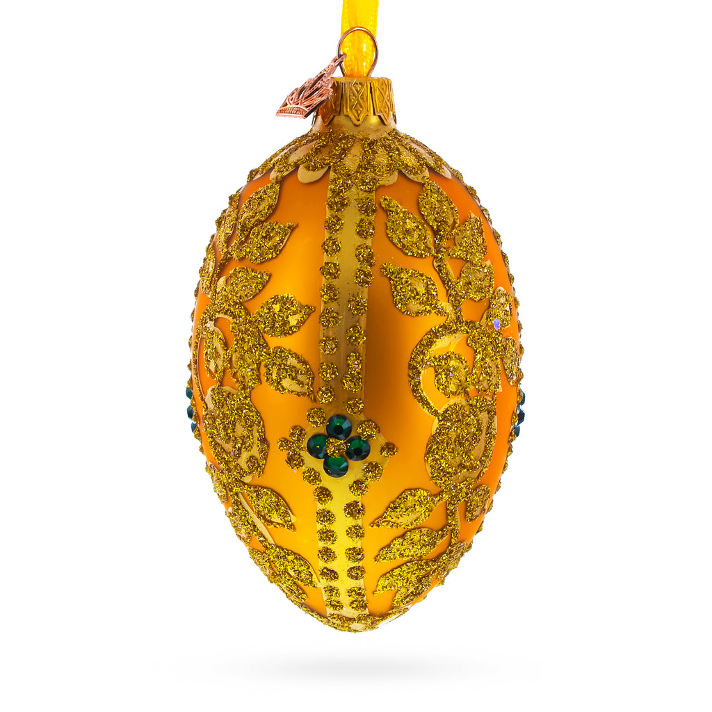 Glittered Golden Leaves Orange Glass Egg Ornament 4 Inches in Gold color Oval