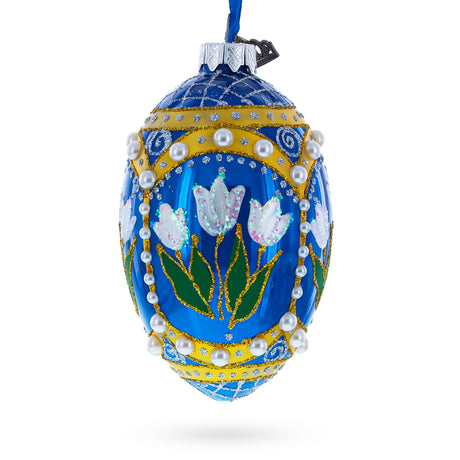 White Flowers and Pearls on Blue Glass Egg Ornament 4 Inches in Blue color, Oval shape
