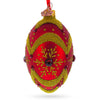 Golden Snowflake on Red Glass Egg Ornament 4 Inches in Red color, Oval shape