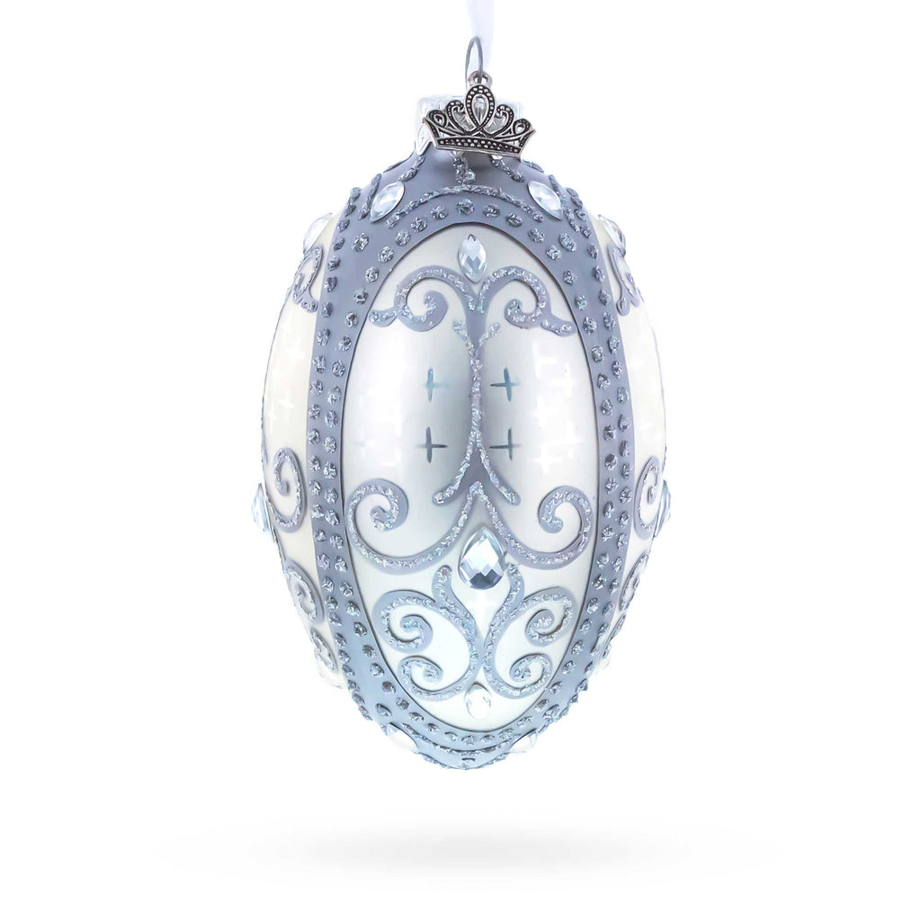 Silver Scrolls on White Glass Egg Ornament 4 Inches in White color Oval