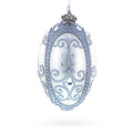 Silver Scrolls on White Glass Egg Ornament 4 Inches in White color Oval