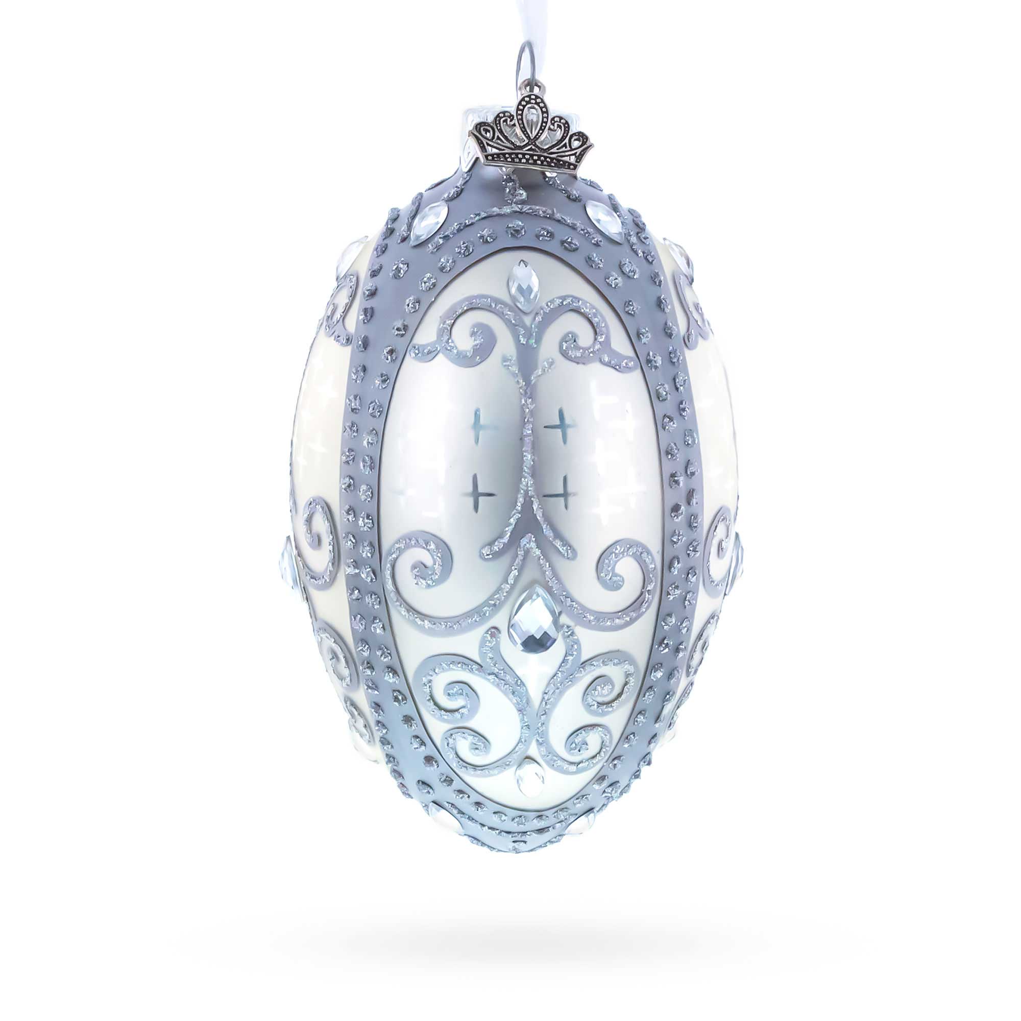 Silver Scrolls on White Glass Egg Ornament 4 Inches in White color Oval