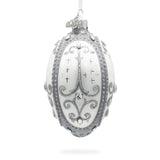 Silver Scrolls on White Glass Egg Ornament 4 Inches in White color, Oval shape