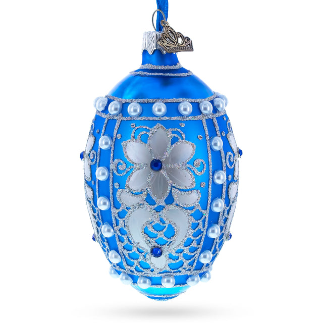 Pearls on Blue Glass Egg Ornament 4 Inches in Blue color Oval