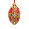 Diamond Star on Red Glass Egg Ornament 4 Inches in Multi color, Oval shape