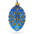 Golden Snowflake on Blue Glass Egg Ornament 4 Inches in Blue color Oval