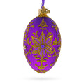 Golden Swirls on Purple Glass Egg Ornament 4 Inches in Purple color Oval