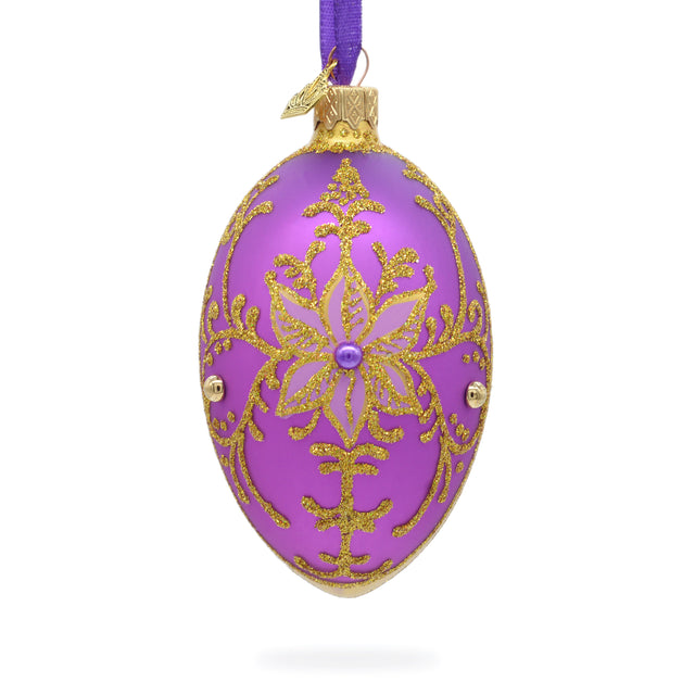 Golden Swirls on Purple Glass Egg Ornament 4 Inches in Purple color, Oval shape