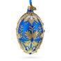 Golden Swirls on Blue Glass Egg Ornament 4 Inches in Blue color Oval