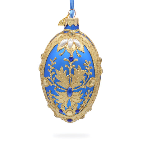 Golden Swirls on Blue Glass Egg Ornament 4 Inches in Blue color, Oval shape
