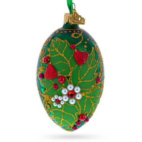 Pearl on Green Leaves Glass Egg Ornament 4 Inches in Green color, Oval shape