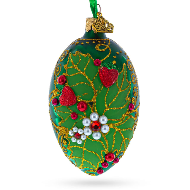 Pearl on Green Leaves Glass Egg Ornament 4 Inches in Green color, Oval shape