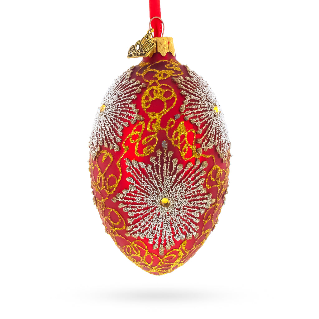 Red and Gold Paisley with Silver Starburst Glass Egg Ornament 4 Inches in Red color Oval