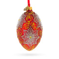 Red and Gold Paisley with Silver Starburst Glass Egg Ornament 4 Inches in Red color Oval